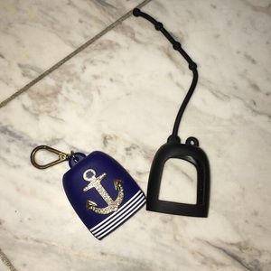 Two bath and body works hand sanitizer holders